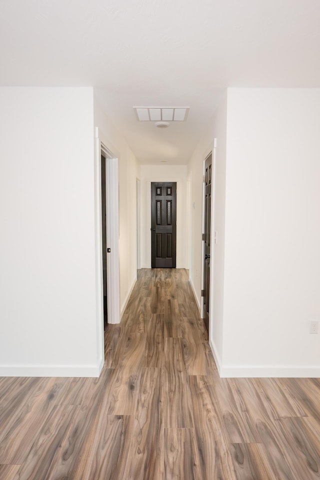 hall featuring hardwood / wood-style floors