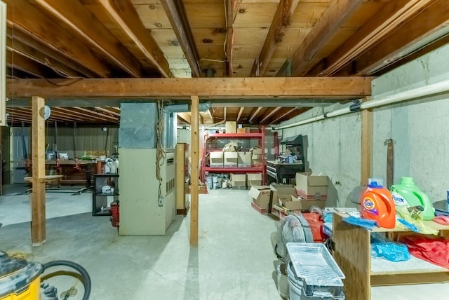 basement featuring heating unit