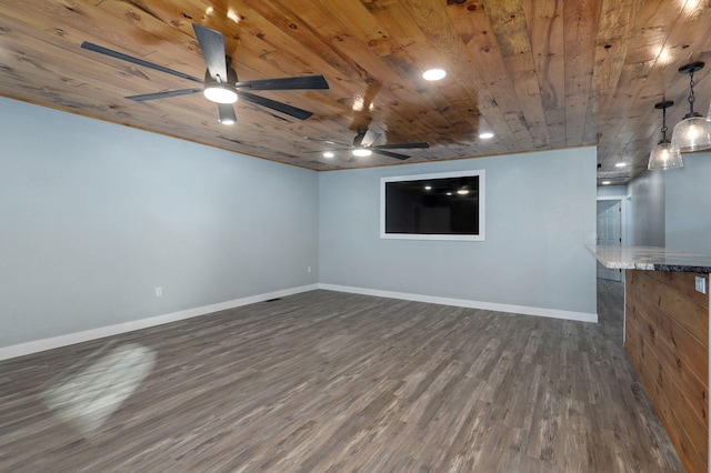 basement with dark hardwood / wood-style flooring, wooden ceiling, and ceiling fan