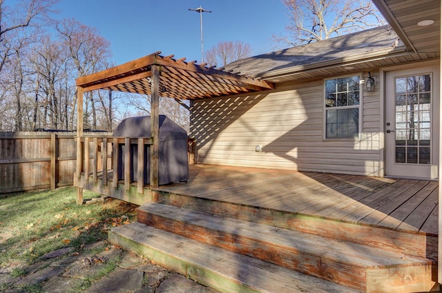 wooden deck with a pergola