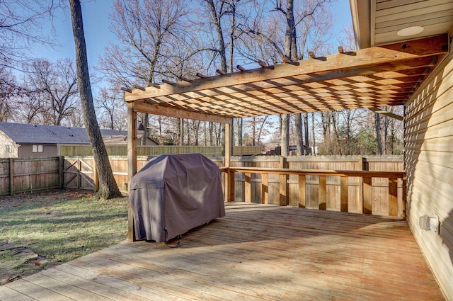 wooden deck with a grill and a pergola