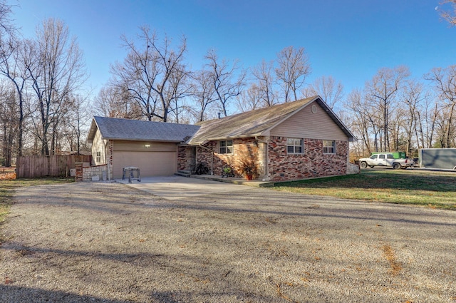 view of home's exterior featuring a garage and a lawn