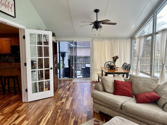 sunroom / solarium with vaulted ceiling and ceiling fan