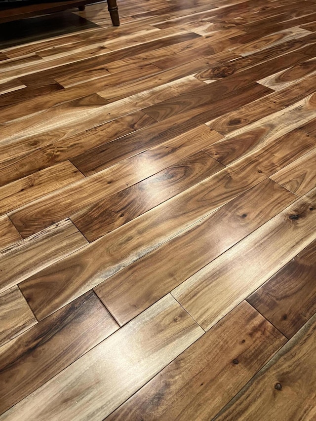 details with hardwood / wood-style flooring