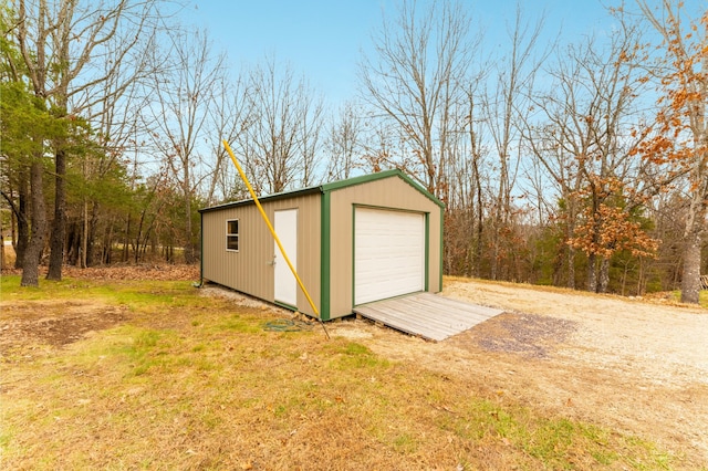 view of outbuilding with a garage