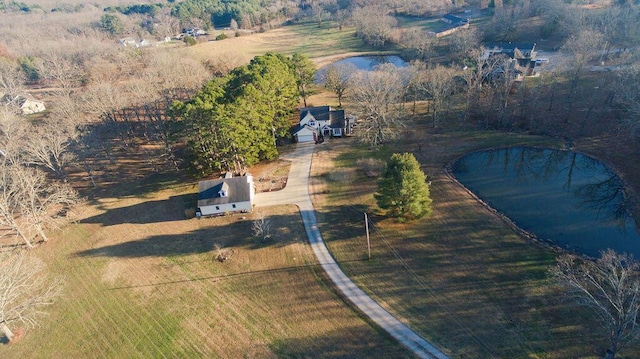 bird's eye view featuring a water view and a rural view