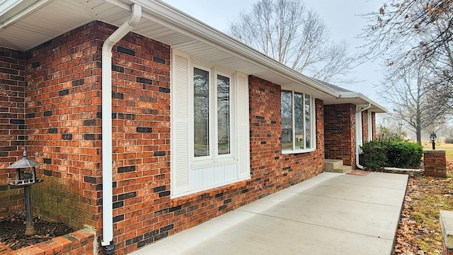 view of property exterior with a patio