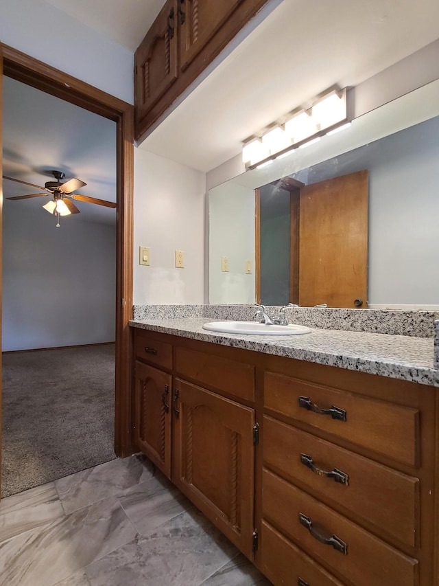 bathroom with vanity and ceiling fan