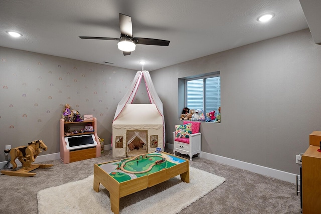 game room with ceiling fan and carpet floors