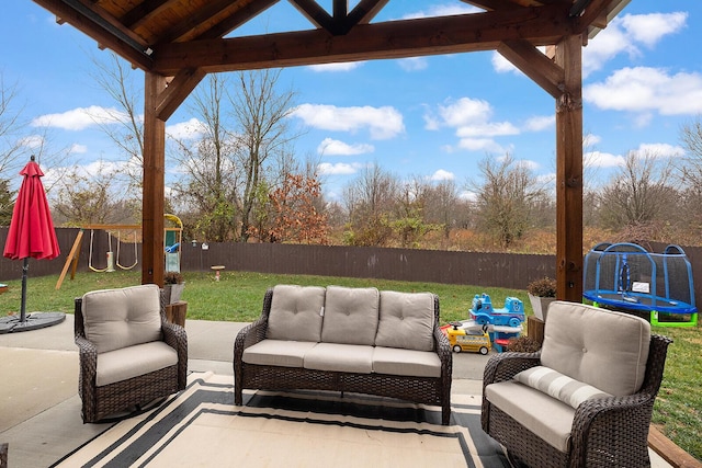 view of patio with a playground, a trampoline, and outdoor lounge area