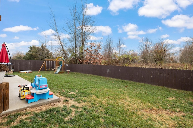 view of yard with a playground