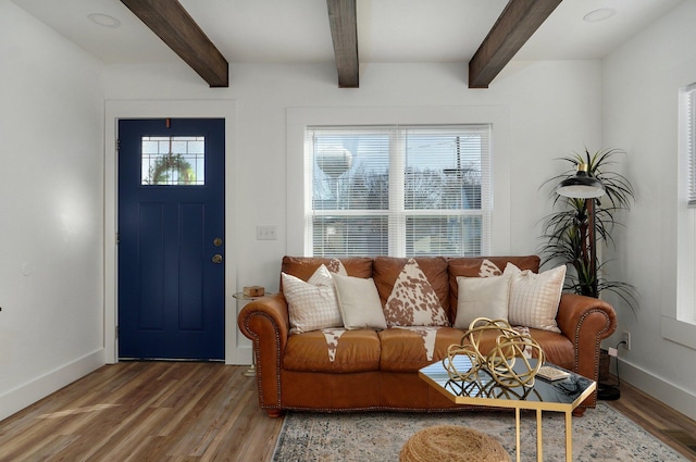 living room with hardwood / wood-style floors and beamed ceiling