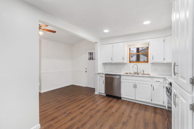 kitchen featuring white cabinetry, decorative backsplash, sink, and stainless steel appliances