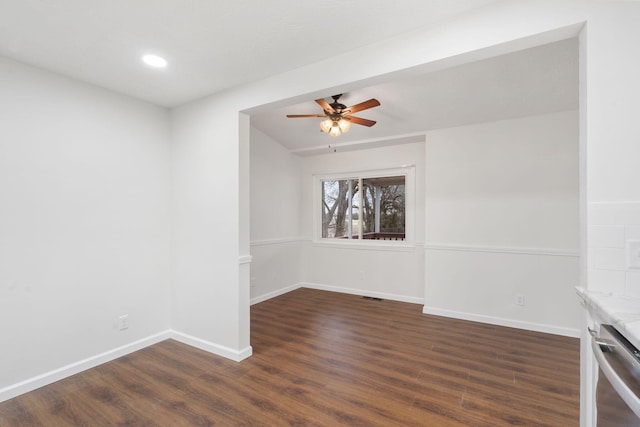 unfurnished room featuring dark hardwood / wood-style floors and ceiling fan