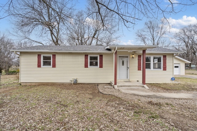 view of front of property featuring a garage