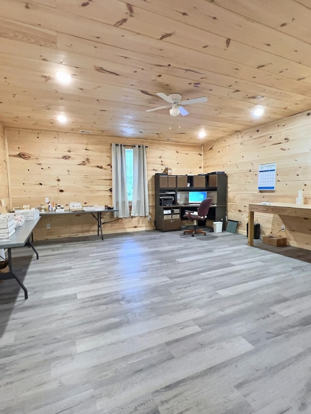 interior space with hardwood / wood-style floors, ceiling fan, and wooden ceiling