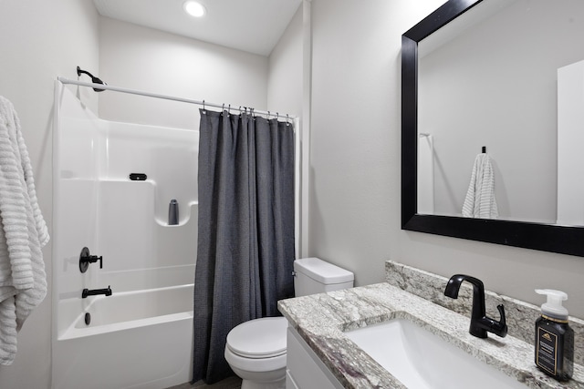 full bathroom featuring toilet, vanity, and shower / tub combo with curtain