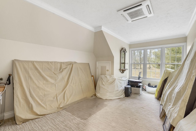 bedroom featuring a textured ceiling, vaulted ceiling, and ornamental molding