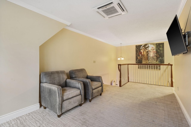 living area featuring carpet floors, ornamental molding, and a notable chandelier