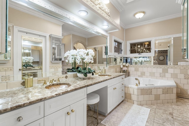 bathroom featuring vanity, tiled bath, and crown molding