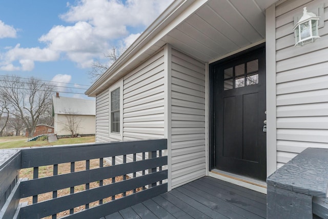 entrance to property with a deck