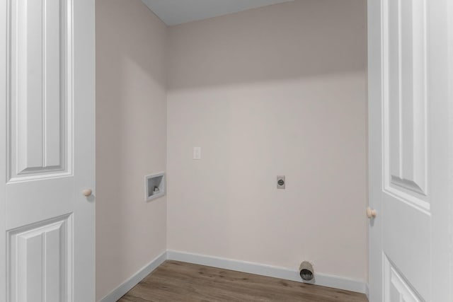 laundry room with washer hookup, light wood-type flooring, and electric dryer hookup