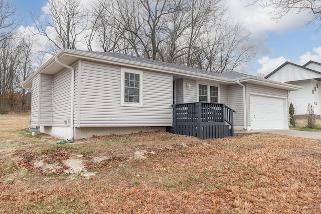 single story home featuring a garage