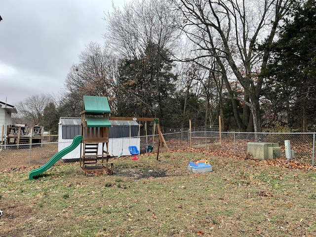 view of play area featuring a lawn