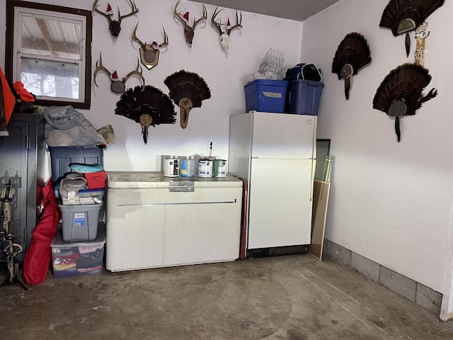 interior space with fridge and white fridge