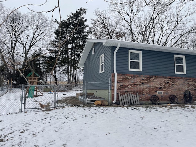 view of snow covered property