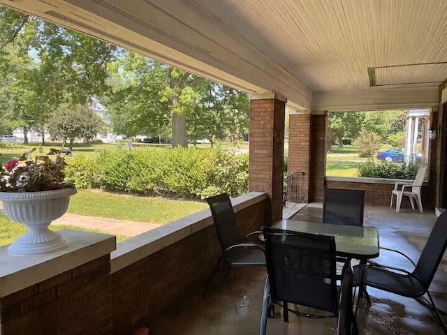 view of patio featuring a porch