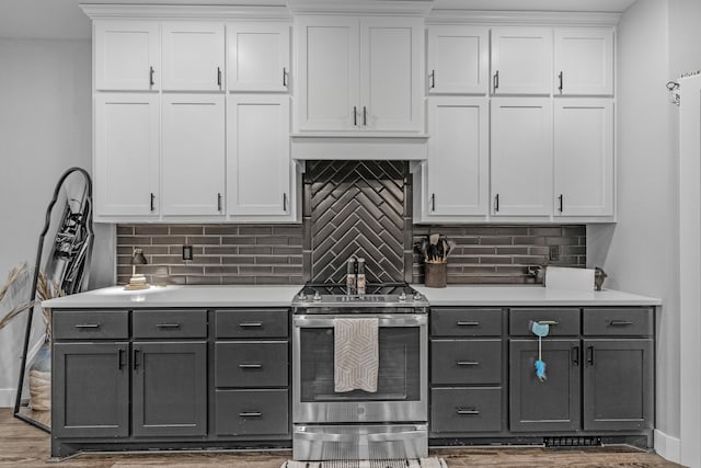 1369 E 398th Rd, Bolivar, MO 65613 - kitchen with stainless steel electric range oven, gray cabinets, and white cabinetry