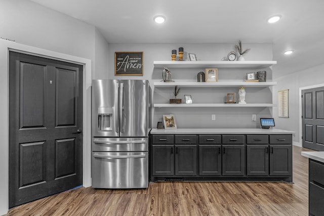 1369 E 398th Rd, Bolivar, MO 65613 - kitchen with stainless steel refrigerator with ice dispenser, dark wood-style flooring, light countertops, open shelves, and recessed lighting