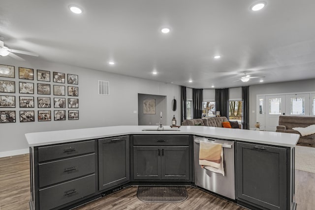 1369 E 398th Rd, Bolivar, MO 65613 - kitchen with stainless steel dishwasher, ceiling fan, open floor plan, light countertops, and recessed lighting