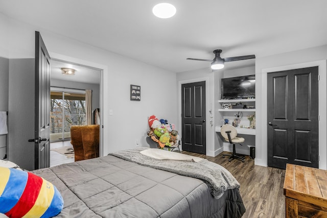 bedroom with ceiling fan and dark wood-type flooring