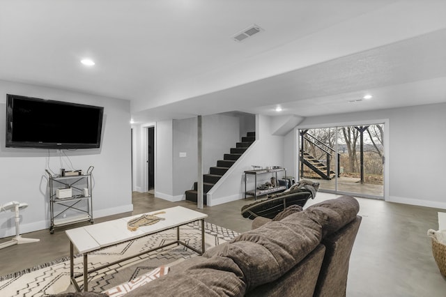 living room featuring concrete floors