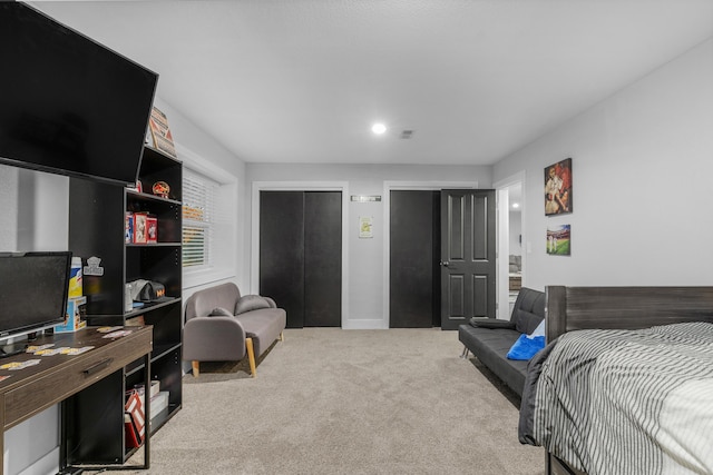1369 E 398th Rd, Bolivar, MO 65613 - carpeted bedroom with multiple closets and recessed lighting