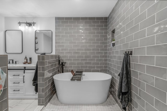 1369 E 398th Rd, Bolivar, MO 65613 - full bath with tile walls, a freestanding bath, vanity, and marble finish flooring