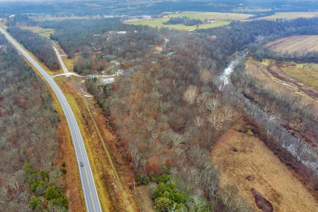 birds eye view of property featuring a rural view