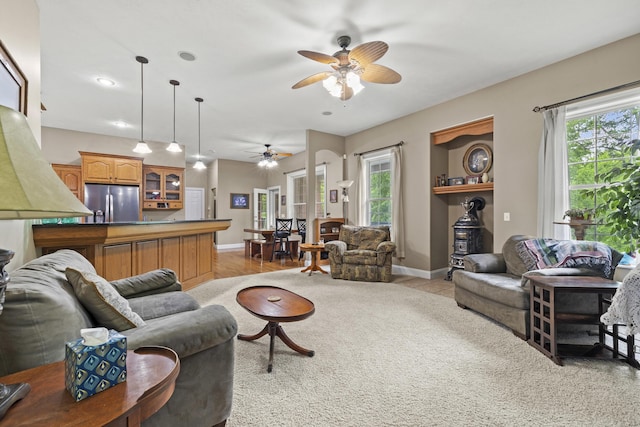 living room featuring ceiling fan