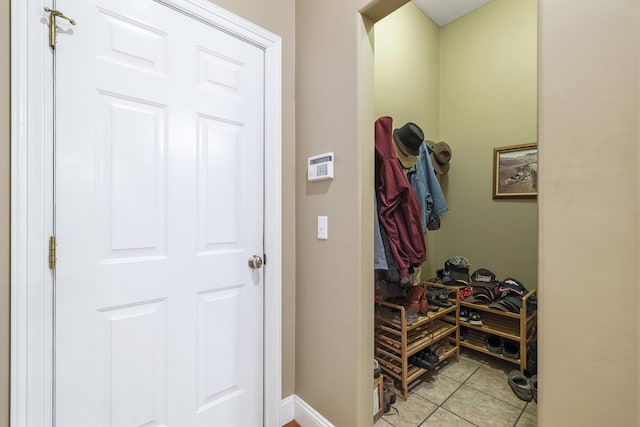 interior space with light tile patterned floors