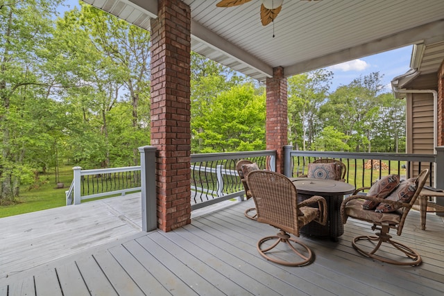 wooden deck with ceiling fan