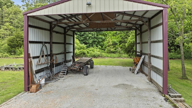 view of vehicle parking with a yard