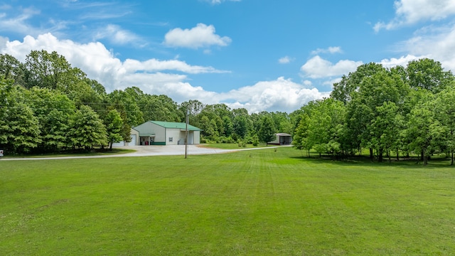 view of yard with a garage