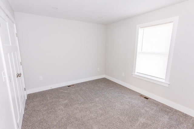 empty room with carpet floors