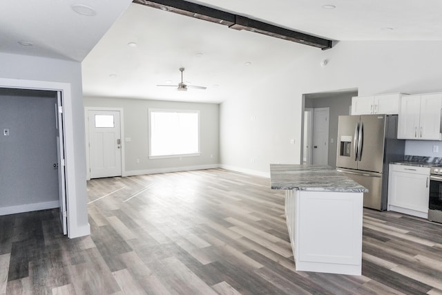 kitchen featuring white cabinetry, ceiling fan, stainless steel appliances, and hardwood / wood-style flooring