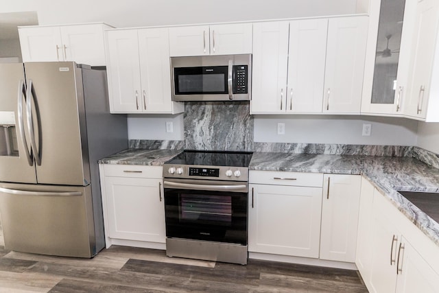 kitchen with white cabinetry and stainless steel appliances