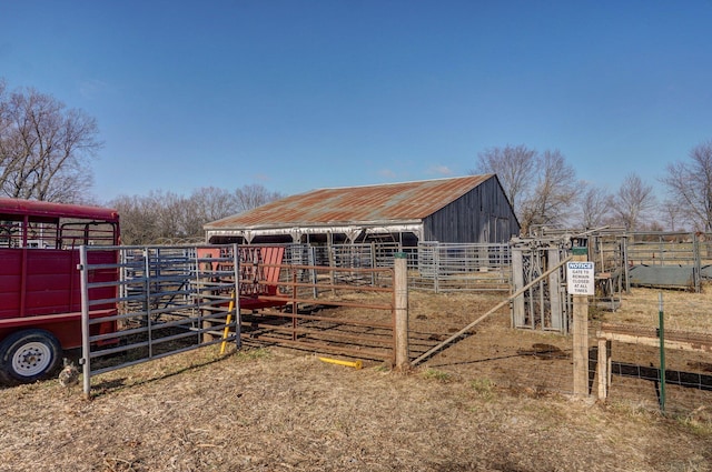 view of outdoor structure with a rural view