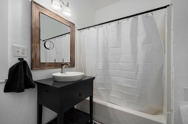 bathroom with vanity and shower / bathtub combination with curtain