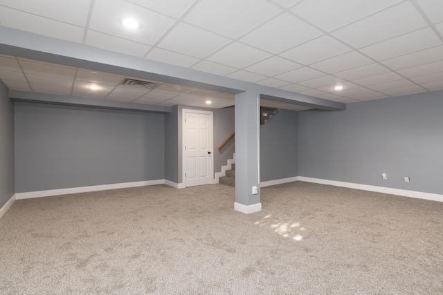 1012 W Monarch Dr, Nixa, MO 65714 - finished basement with carpet floors, stairs, a drop ceiling, and recessed lighting